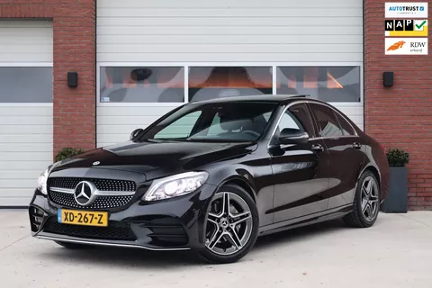 Mercedes-Benz C-klasse 180 AMG-Line Facelift - Panoramadak - Sfeerverlichting - Multibeam LED - Camera - Groot scherm - BTW